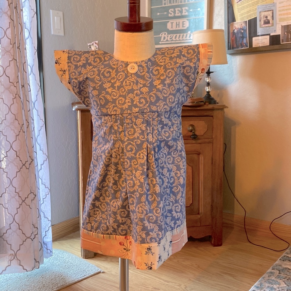 Cute handmade girls dress. Unique design, short sleeve. Size 12Months.